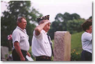 Saluting their fellow soldiers