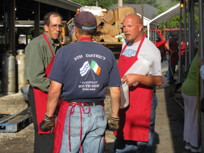 Marty ?, Jay Wessler and John Barrett work at kettle service on Saturday morning.