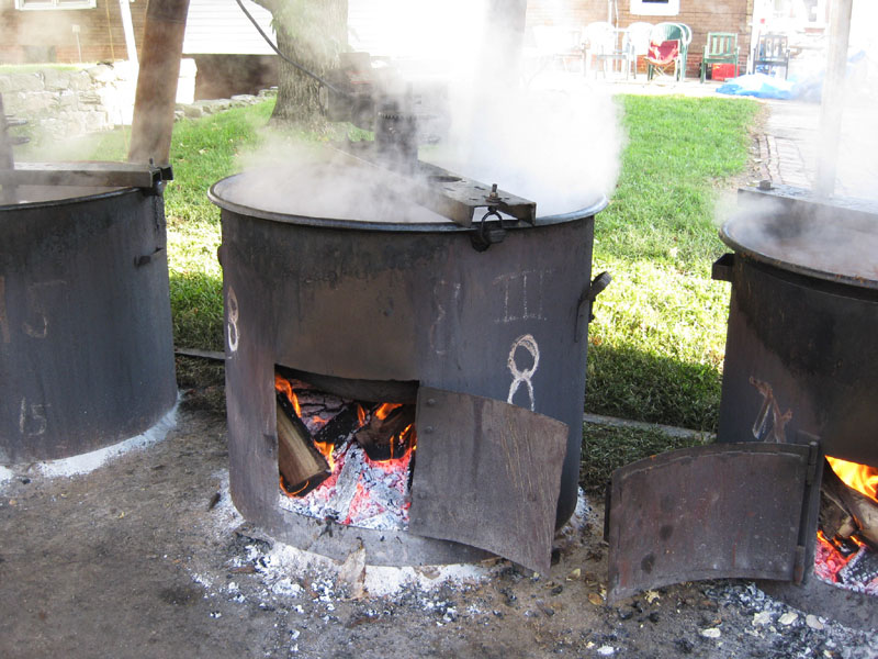 Steaming kettle of hot burgoo -- cooked in iron kettles over wood-burning fires.