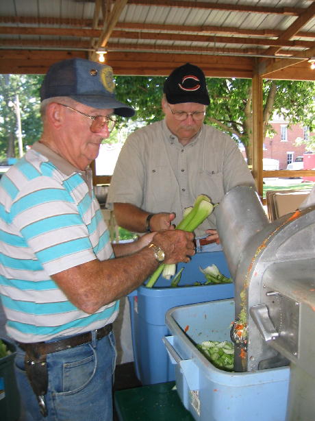 Gib Harbin and Roger Burrus work on the celery.
