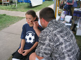 Face painting was popular with the kids.