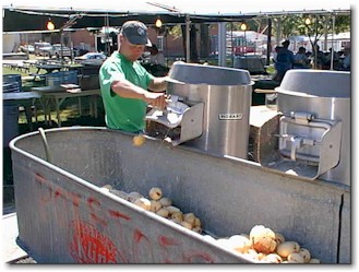 Gale Kleinschmidt at the potato-peeling machine