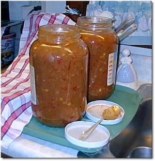 Coming soon to your kitchen? Two gallons of burgoo, waiting for the company to show up at the dinner table.