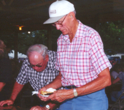 Orville Fricke secures a piece of pie.