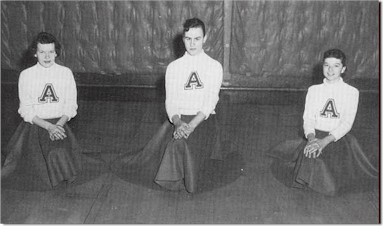 1958 Arenzville Grade School cheerleaders: from left: Pam Wessler, Ann Dober, Emily Brasell.