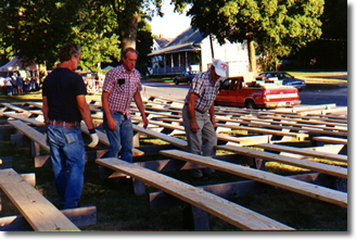 Men arranging planks